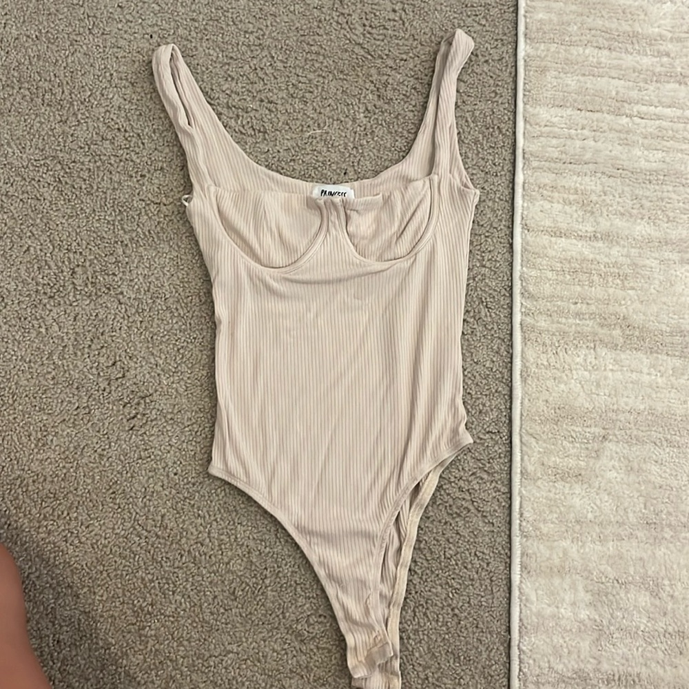 Nude flattering body suit